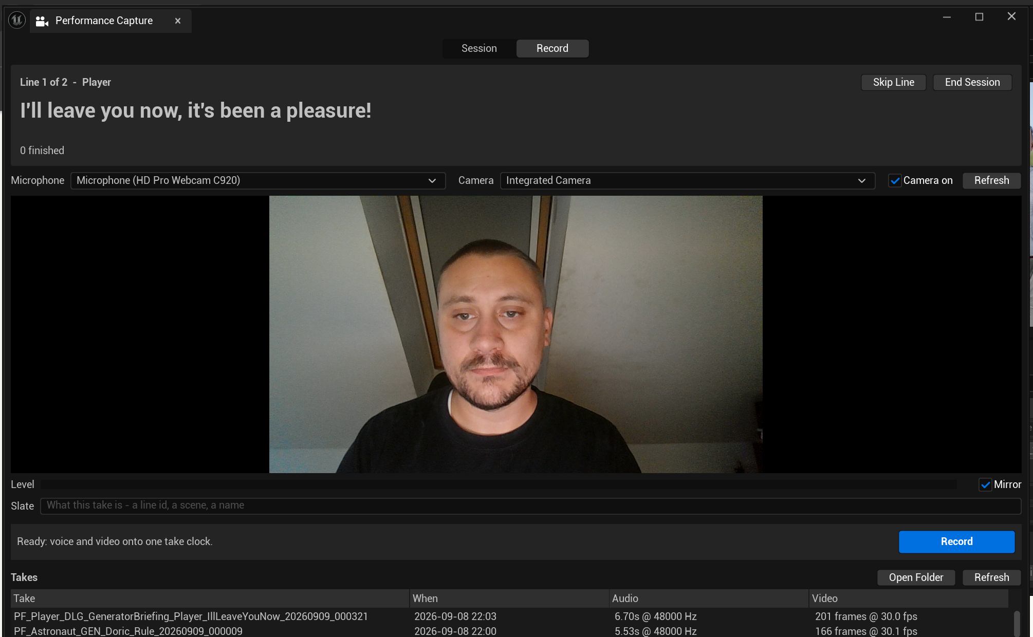 The Performance Capture panel on its Record page. A header reads 'Line 1 of 2 - Player' with Skip Line and End Session buttons, the line 'I'll leave you now, it's been a pleasure!' in large type, and '0 finished'. Microphone is set to 'Microphone (HD Pro Webcam C920)' and Camera to 'Integrated Camera', with Camera on ticked. A large live webcam preview shows a man framed head and shoulders against a pale wall. Below: a Level meter with a Mirror tick-box, a Slate field prompting 'What this take is - a line id, a scene, a name', a status line reading 'Ready: voice and video onto one take clock.' and a blue Record button. A Takes list at the foot shows two takes with columns Take, When, Audio and Video: 6.70s at 48000 Hz with 201 frames at 30.0 fps, and 5.53s at 48000 Hz with 166 frames at 30.1 fps.